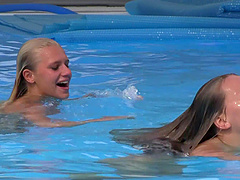 Outdoor teen lesbian fum with teens Nessy and Sara at the pool