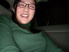 Japanese cutie in glasses Suzuhara Emiri shows off her pussy in a car