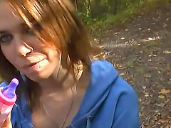 Redhead amateur takes some money to suck a fat dick in the woods