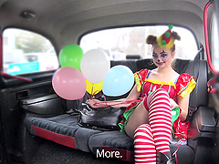 Kinky chick dressed as a clown enjoys riding a taxi driver's dick