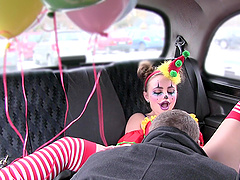 Kinky chick dressed as a clown enjoys riding a taxi driver's dick