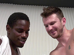 Skinny white man gives his black friend a nice handjob at home