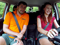 Foxy redhead Charlie Red offers her pussy to pass the drivers test