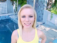 Cute blonde Elaina Raye licks and rubs a dick on the poolside