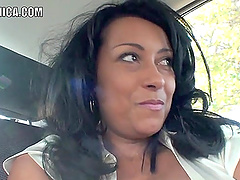 Busty slut Danica Collins flashes her boobs in back of the car