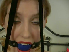 Blonde named Cowgirl gets her vag rubbed with a toy in BDSM vid