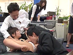 Japanese darling enjoys while having a gangbang in the office