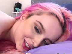 Lexi Lore with pink hair enjoys while getting penetrated