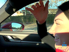 Lily Adams moans while getting fingered in the car in POV