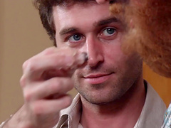 Video of two handsome guys preparing the lunch in a kitchen