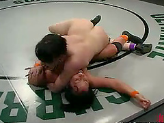 Vanquishing Rival in Wrestle for Strapon Fuck on Ring