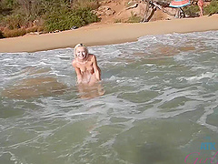 Public beach romp with a bikini-clad beauty