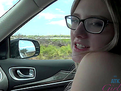 Steamy car ride with natural tits and glasses babe