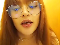 Solo webcam show with busty latina babe in glasses