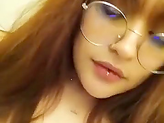 Solo webcam show with busty latina babe in glasses