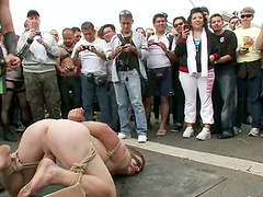 Naked tied up guy gets humiliated in a street in public