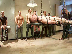 Chained guy gets humiliated and fucked by other men