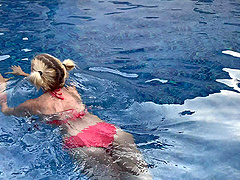 Blonde bombshell gives a sloppy blowjob by the pool