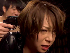 Naughty japanese in black leather gets brutally rammed.