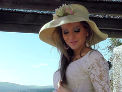 Royal beauty wearing designer fascinator has orgasm while masturbating outdoors