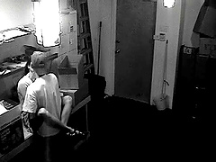 A hidden security cam catches a couple fucking at work