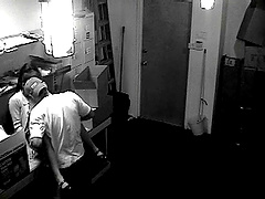 A hidden security cam catches a couple fucking at work