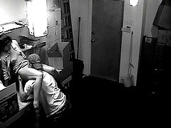 A hidden security cam catches a couple fucking at work