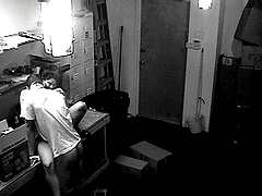 A hidden security cam catches a couple fucking at work