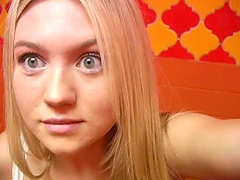 Kinky blonde babe strips and finger fucks her pink cunt in a bathroom